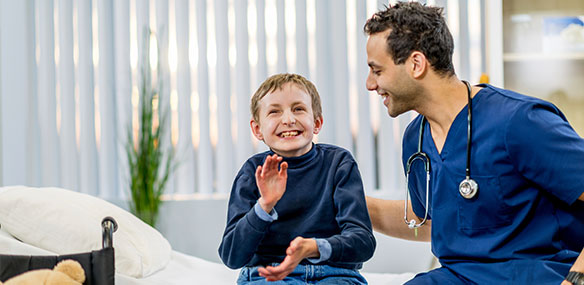 Special needs boy with doctor