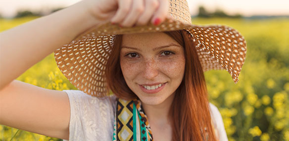 Teen girl with freckles and red hair